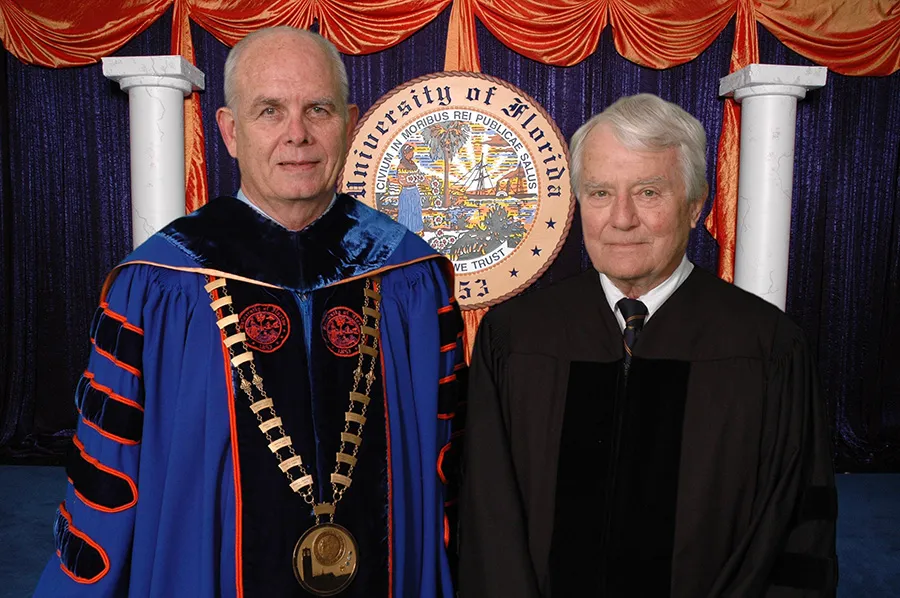 William Anspach Jr., MD receivces an honorary degree in technology from UF during the doctoral degree commencement ceremony December 13, 2013