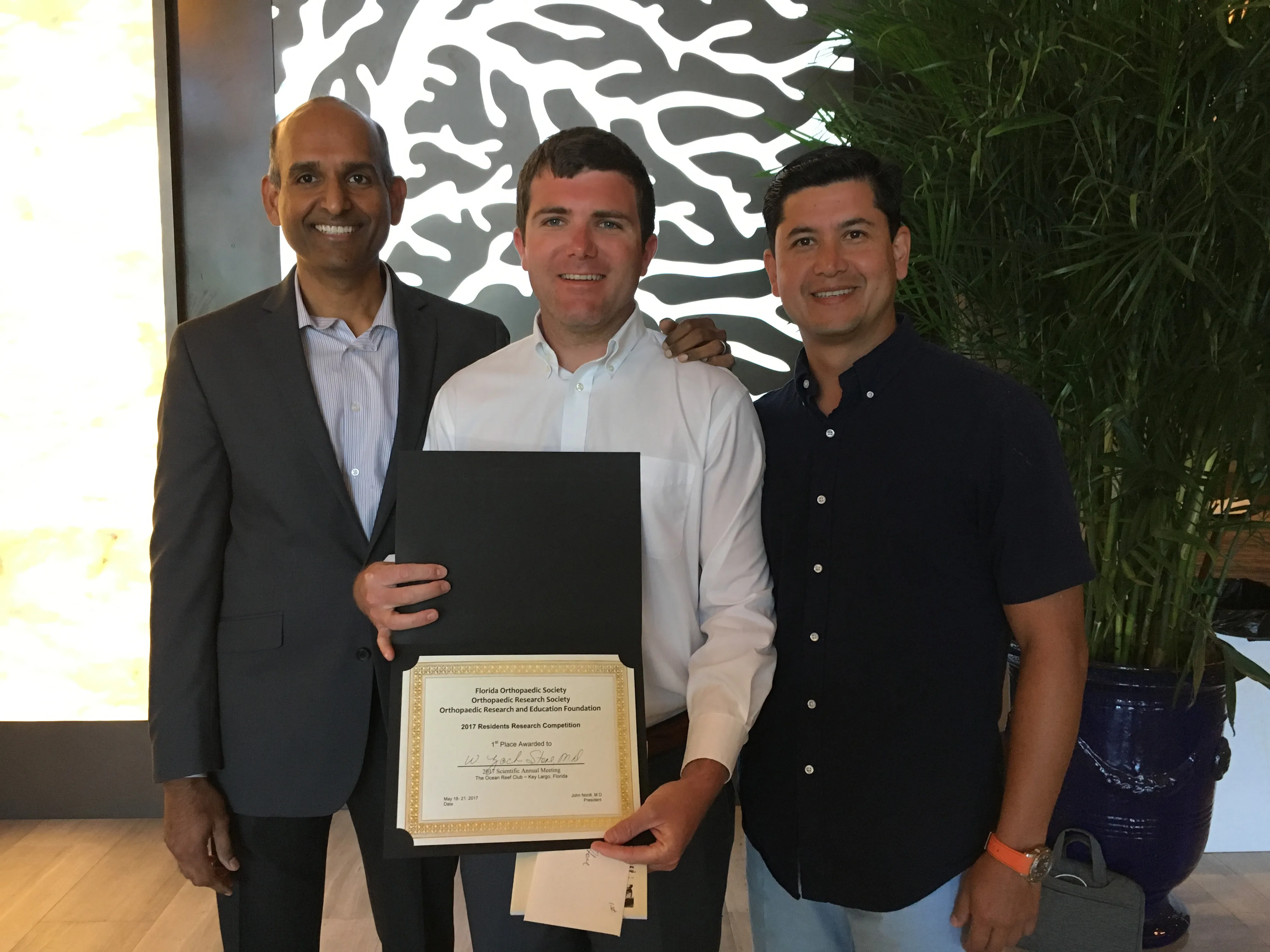 Zach Stone 1st Place Resident Research Award at 2017 FOS Annual Meeting (picture with Dr. Parvataneni and Dr. Prieto)